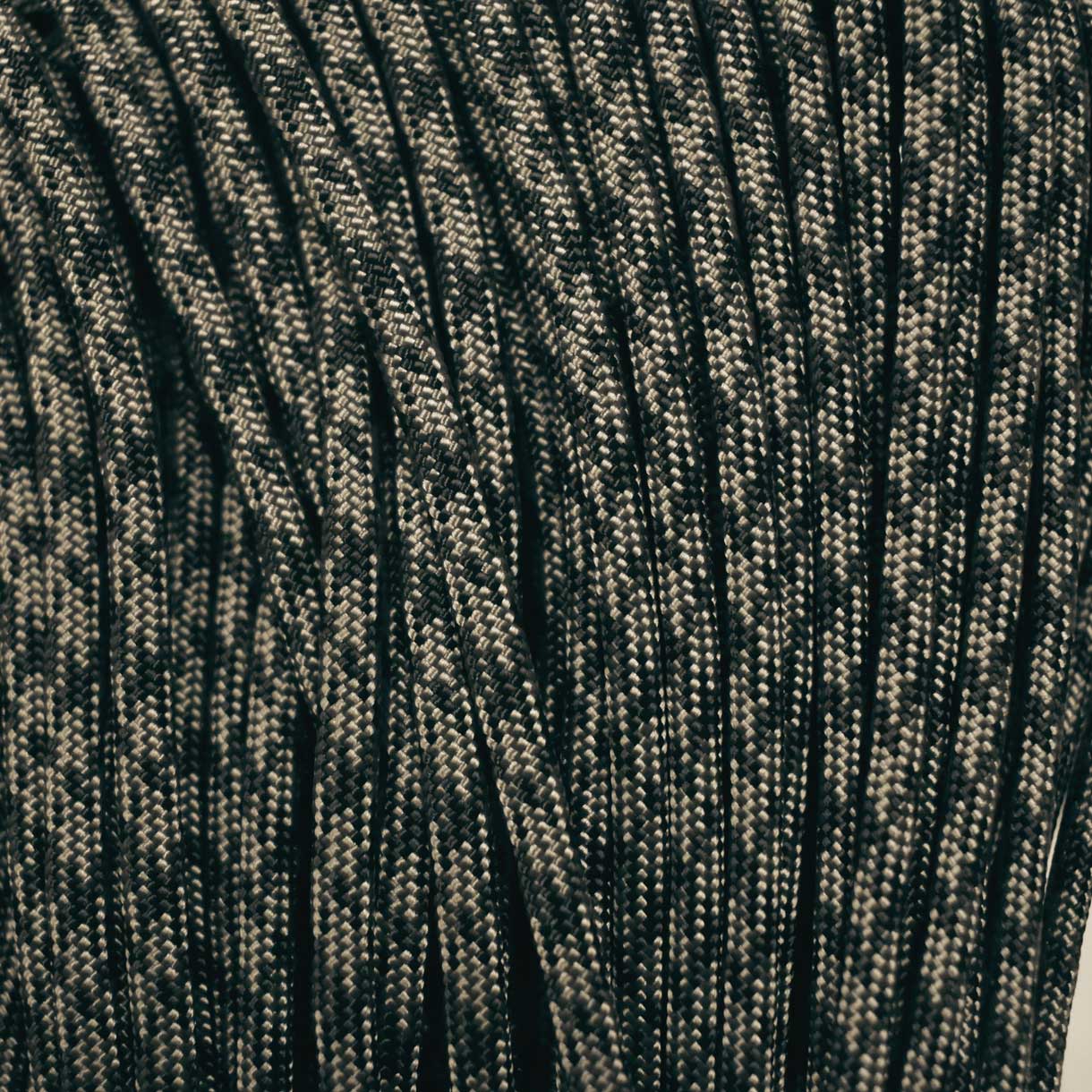 4 mm (5/32”) 550 Paracord Foliage Green and Black Camo Made in the USA Nylon/Nylon (100 ft)