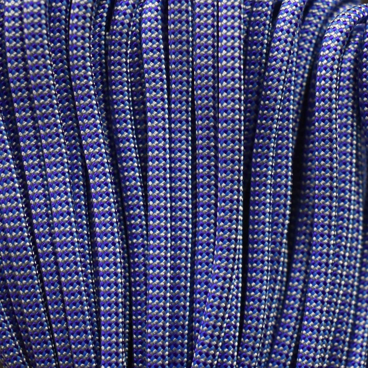 4 mm (5/32”) 550 Paracord White, Acid Purple and Colonial Blue (Shockwave) Made in the USA Nylon/Nylon (100 ft)